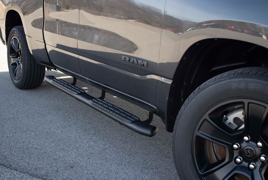 Fishbone's 5-inch oval side steps designed for Dodge Ram 1500 Crew Cab, with a distinct black textured finish and molded Fishbone grip step pad.