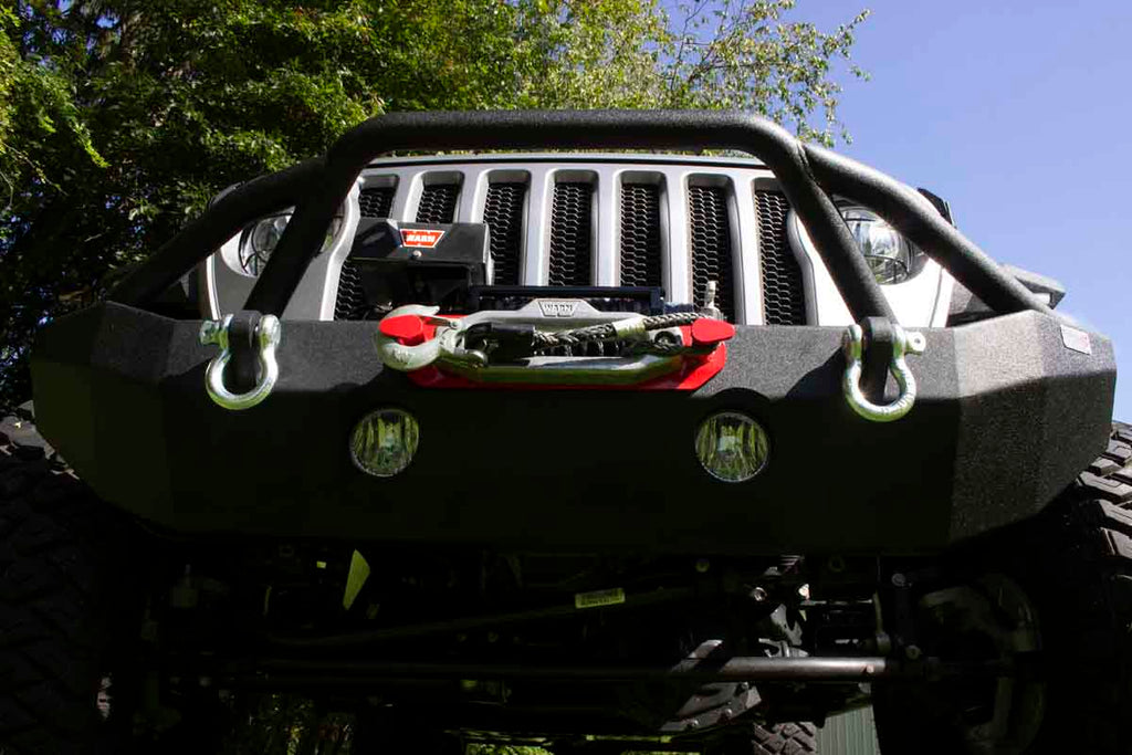 Fishbone Offroad Mid Width Front Winch Bumper, expertly designed for modern Jeep Wrangler JL and Gladiator JT models, showcasing top-tier protection and style.