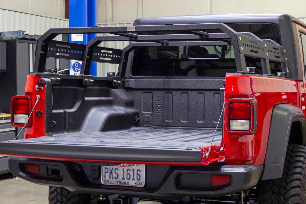 Fishbone Offroad Half Height Tackle Rack on a 2020 Jeep Gladiator JT, highlighting optimal storage capabilities for off-roading enthusiasts.