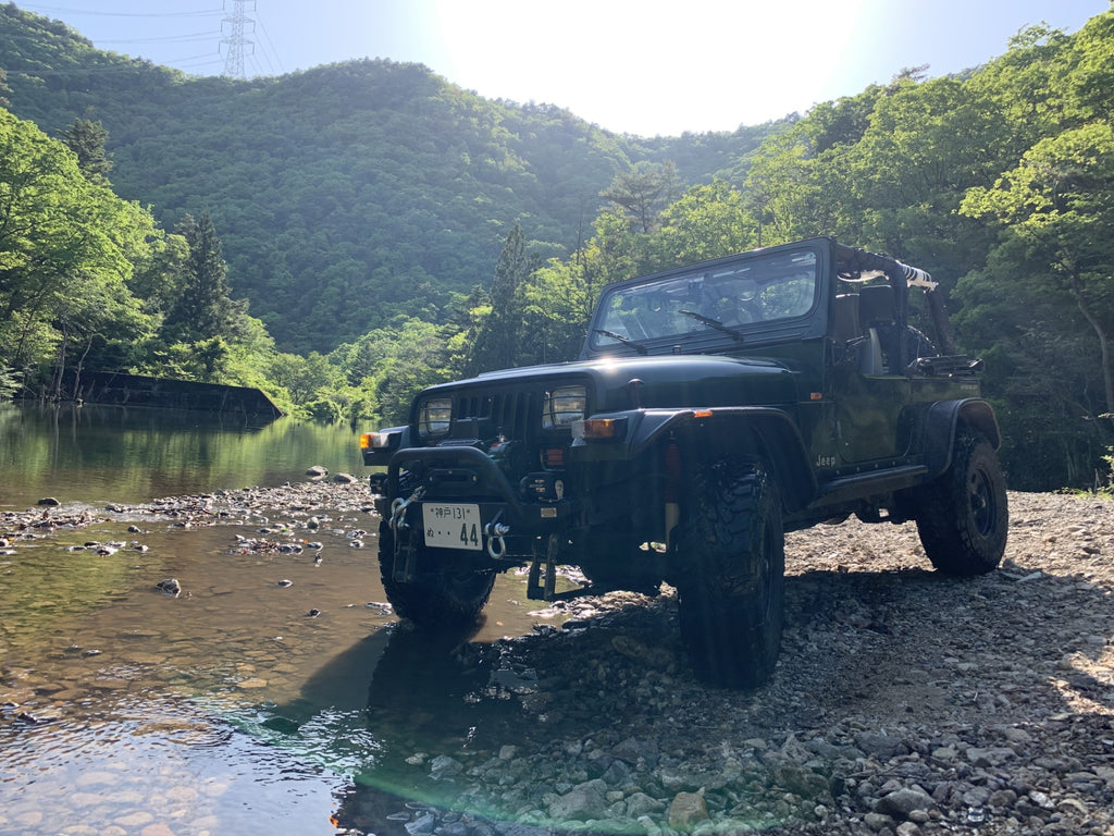 Fishbone Offroad Piranha Front Bumper with raised winch guard, crafted for the Jeep Wrangler TJ, displaying durability and modern design.
