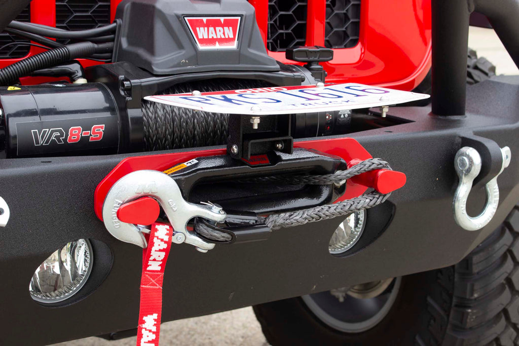 Fishbone Offroad black powder-coated fairlead license plate mount