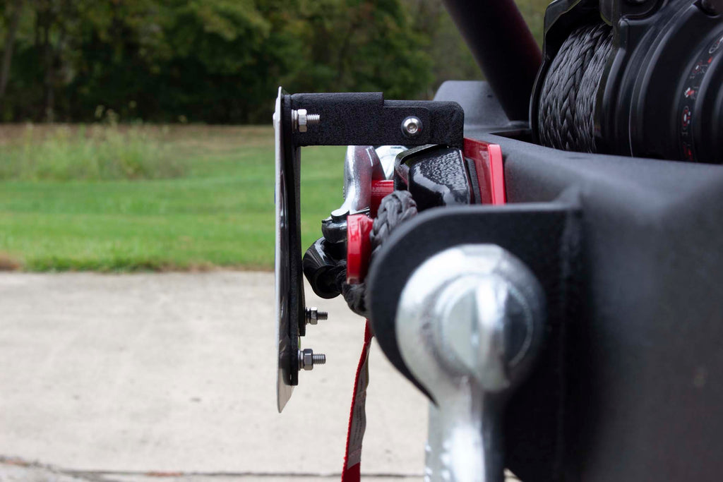 Fishbone Offroad black powder-coated fairlead license plate mount