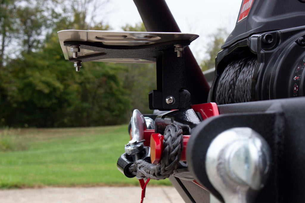 Fishbone Offroad black powder-coated fairlead license plate mount