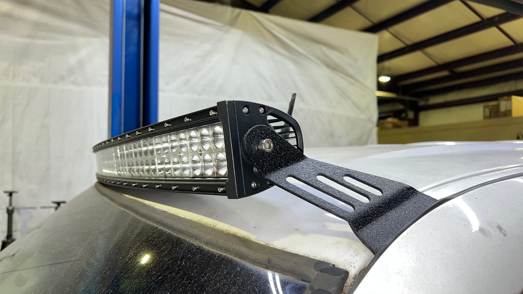 Sleek black Roof Mounted Lightbar Bracket on a Chevy Silverado