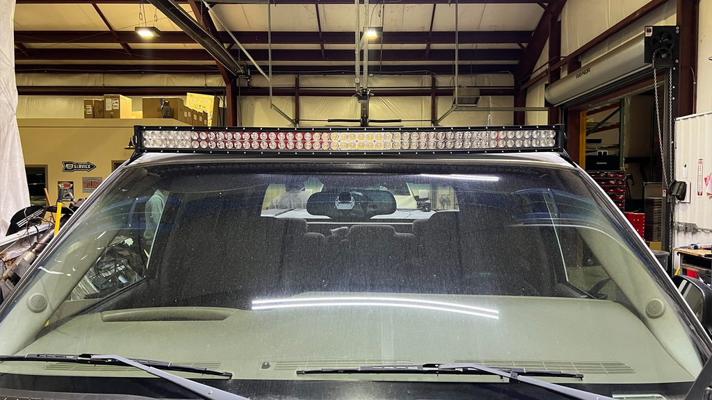 Sleek black Roof Mounted Lightbar Bracket on a Chevy Silverado