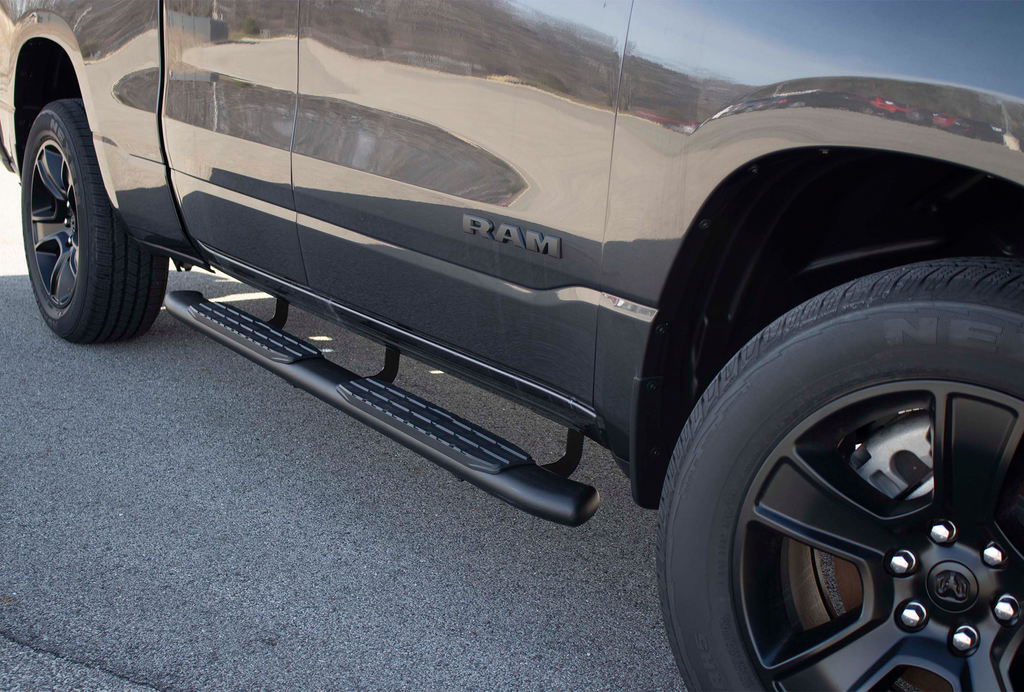 Luxurious 5-inch oval side steps in a commanding black, precision-crafted for Dodge Ram and Ram 1500, 2500, 3500 Crew Cab, accentuated by the iconic Fishbone grip step pad.