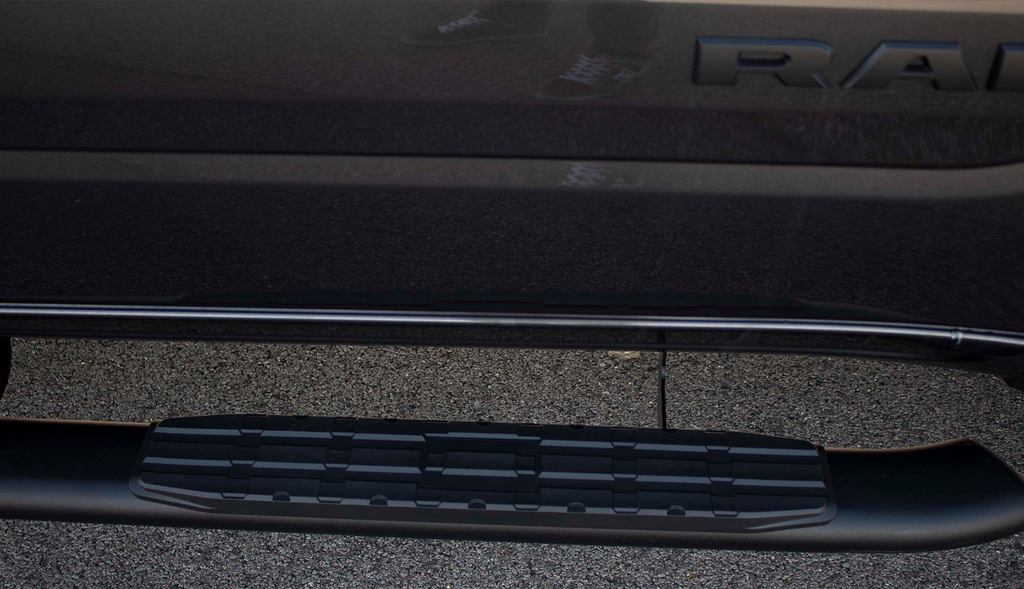 Refined 5-inch oval side steps with a robust black textured finish, precisely tailored for Chevrolet & GMC double cab pickups, complete with the signature Fishbone grip step pad.