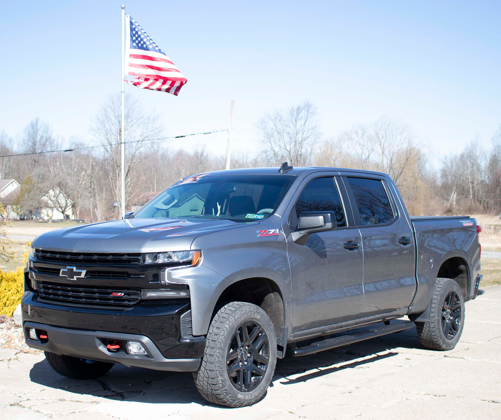 Sleek and stylish 5-inch oval side steps with a robust black finish, tailored for Chevrolet Silverado and GMC Sierra Crew Cab models, highlighted by Fishbone’s signature grip step pad.