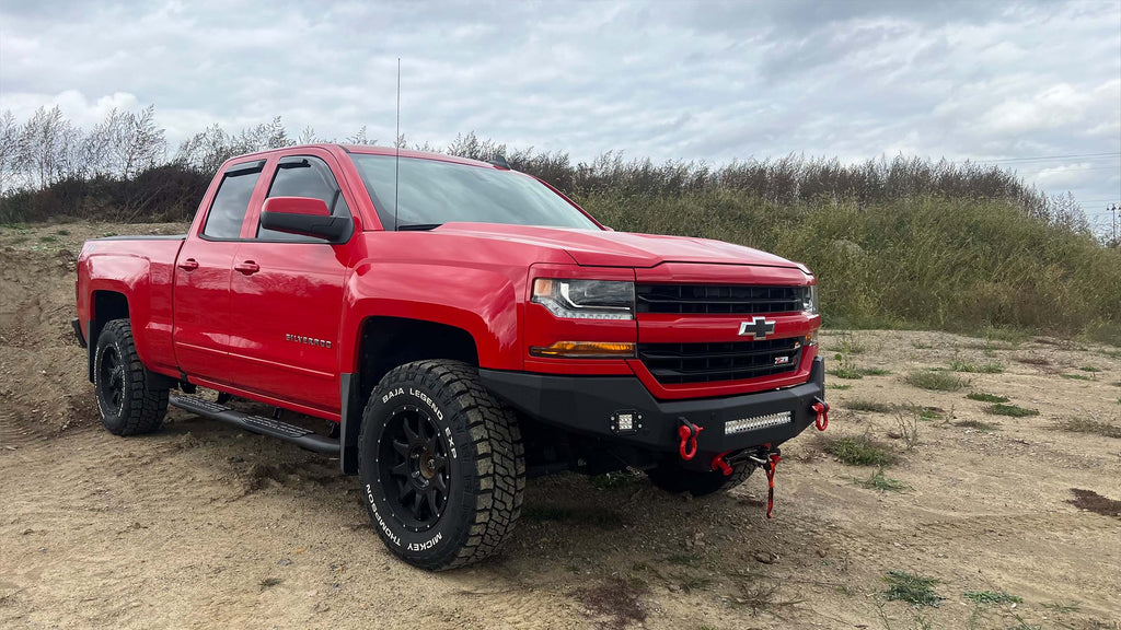 A raw steel rear bed mount designed for 2004-2012 Chevy Colorado and GMC Canyon, with a heavy-duty design and included support bracket for weld-on installation